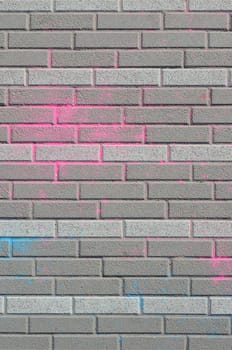 Multi colored earth, paving slabs, powder coated with dry colors at the Holi festival close up