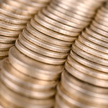 Large pile of big golden coins. Financial success money background for rich life concepts, banking and profit in Ukraine