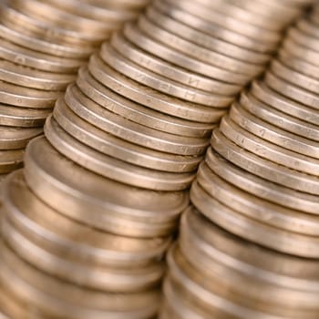 Large pile of big golden coins. Financial success money background for rich life concepts, banking and profit in Ukraine