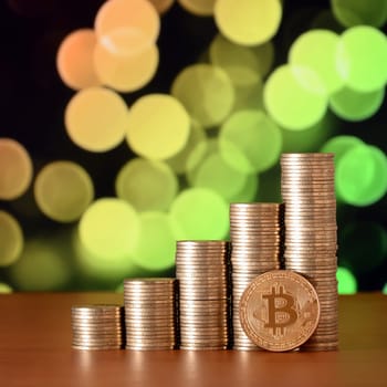 Coin stack and golden bitcoin. Closeup of bitcoin digital currency and coin money stacks, cryptocurrency money financial business concept