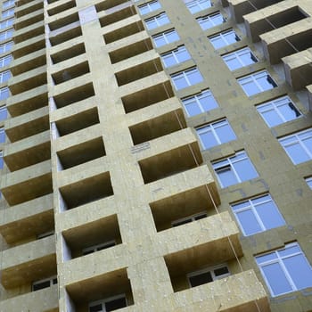 New city residential multi store apartement high building house facade under construction
