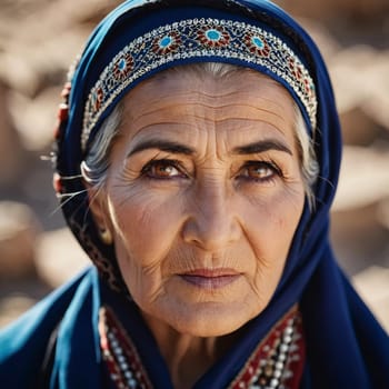 A mature Tajik woman 75 years old, gazes directly showcasing intricate traditional attire, rich cultural heritage of her nationality, evoking wisdom and grace. Brunette woman, wearing a headscarf. AI