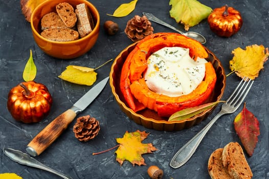 Pumpkin baked with cheese.