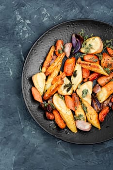 Colorful grilled and roasted root vegetables.