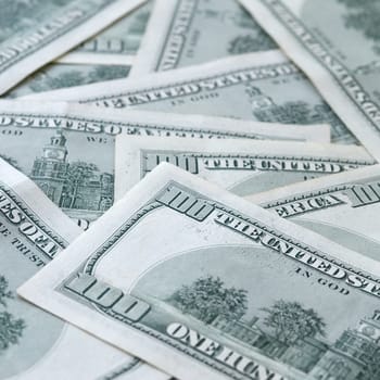 Background of 100 dollar bills. Abstract textured backdrop with many hundred money bills. Rich life concept. Huge amount of american funds