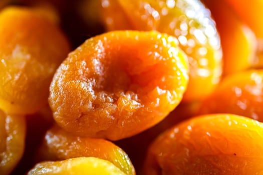 Close-up of soft apricots, dried and pitted.