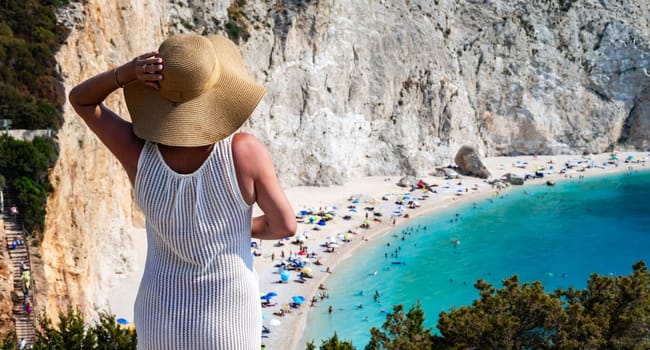 A tourist looking at Porto Katsiki Beach, on the coast of Lefkada, in the Ionian Islands of Greece