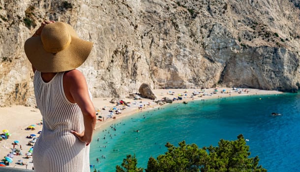 A tourist looking at Porto Katsiki Beach, on the coast of Lefkada, in the Ionian Islands of Greece