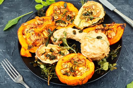 Freshly baked and juicy of pumpkin. Healthy vegetarian food.