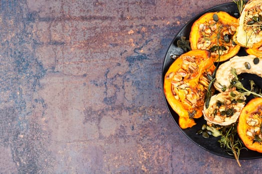 Freshly baked and juicy of pumpkin. Healthy vegetarian food.