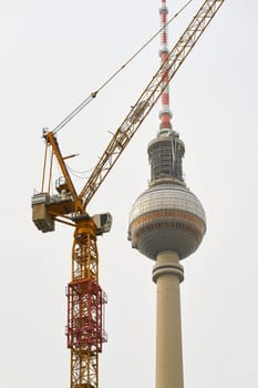 Construction crane on the Berlin television tower, the landmark of the German capital