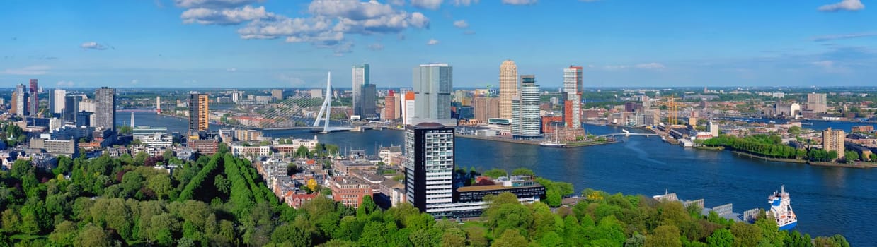 Aerial panorama view of Rotterdam city and the Erasmus bridge Erasmusbrug over Nieuwe Maas river from Euromast