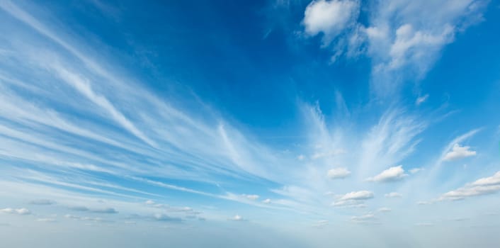 Peaceful and serene sky with clouds background