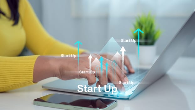 Women work laptop on workplace background, Concept of working process, Startup business concept, digital marketing, Startup innovates to connect customer, Strategic planning and business success.