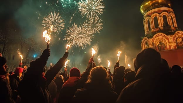 Crowds hold torches aloft as colorful fireworks illuminate the night sky near an iconic dome creating a festive atmosphere.