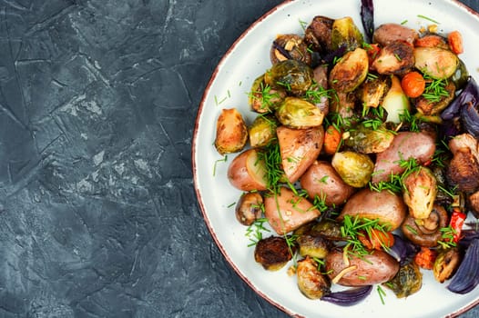Brussels sprouts and potatoes caramelized. Healthy eating. Copy space.
