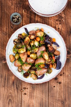 Brussels sprouts and potatoes caramelized. Healthy eating. Copy space.