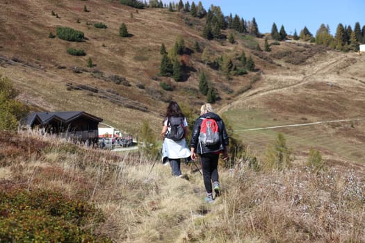 Two women hike in the hiking paradise and the holiday region of South Tyrol / Alto Adige on the Rosskopf
