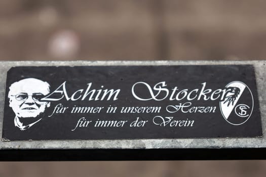 On the grandstand of the Europa Park Stadium,a small plaque commemorates former president Achim Stocker,who died on 1 November 2009