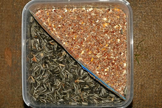 Bird food, sunflower seeds and grain