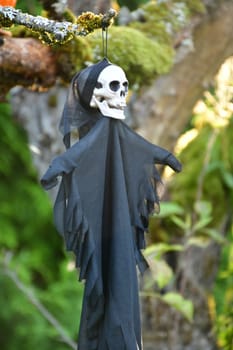 Halloween ghosts decorated in a garden