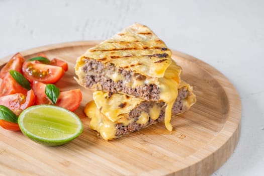 Portion of taco with beef mince and cheese