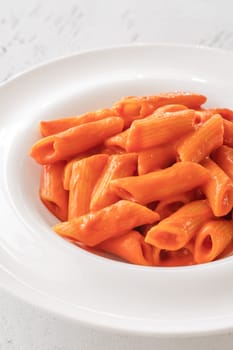 Penne pasta with bell pepper and cream sauce