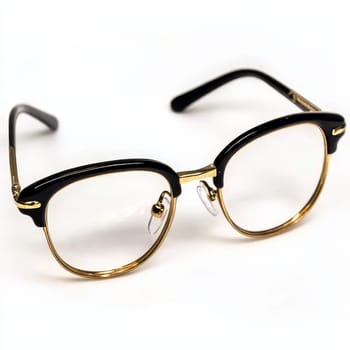 Elegant black and gold glasses with a classic design, perfect for fashion and eyewear enthusiasts.