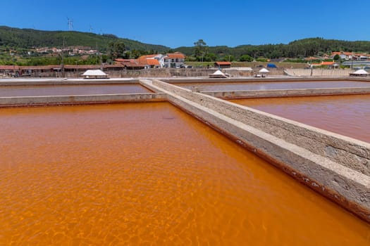 Rio Maior, Portugal: July 7, 2024: Fonte da Bica Salt Flats, aka Salinas de Rio Maior, system of shallow water compartments and gutters for salt extraction, Portugal