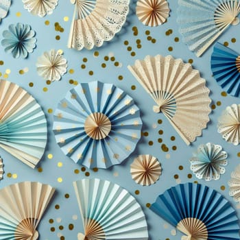 A flat lay of blue and white paper fans and gold confetti on a blue background. A high-quality photo.