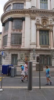 Nice, France - September 22, 2024: People going near building of old opera in Nice , France