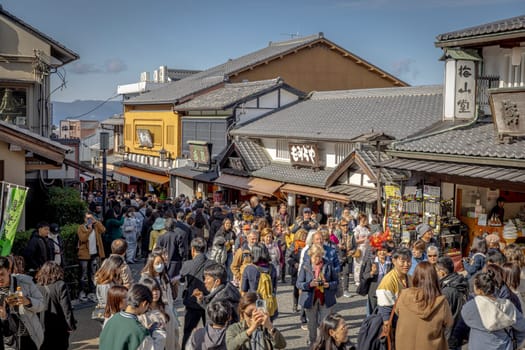 Tourists  crowding the street near Kiyomizu dera temple in Kyot
