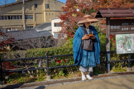 Buddhist monk wearing traditional clothes near  Kiyomizu dera Kyoto