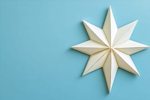 A beautifully crafted white star catches the eye against a smooth blue background, radiating holiday cheer and simplicity. Ideal for bringing festive spirit to any setting.
