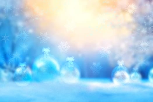 Abstract blurred festive evening winter Christmas background with shiny golden and yellow white bokeh illuminated snowy landscape with stars, baubbels. Card design.