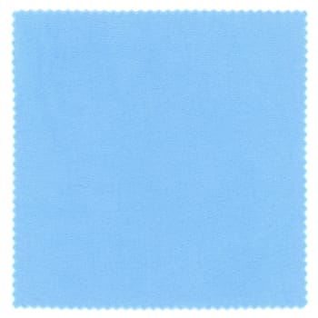 light blue fabric swatch sample with zig zag border cut with pinking shears isolated over white background