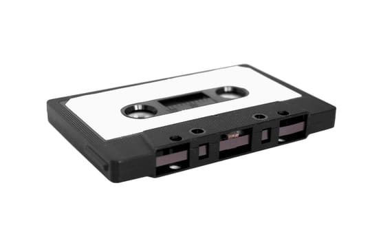 magnetic tape cassette for analog audio music recording over white background