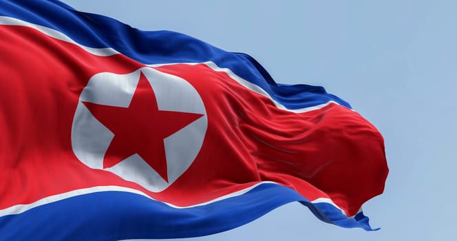 North Korea national flag waving in the wind on a clear day. Red flag with star and blue white stripes. 3d illustration render, Rippling fabric.
