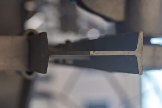 Close up of welding i beams for metal construction, showcasing strength and precision in industrial settings