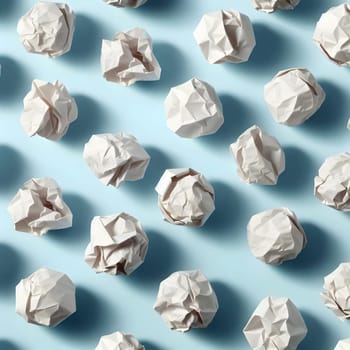 A pattern of crumpled paper balls on a light blue background. The paper balls are arranged in a diagonal pattern. A high-quality AI-generated photo.