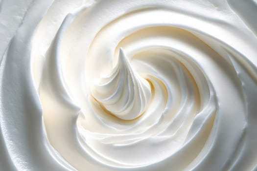 A beautifully crafted whipped cream swirl showcases a clean and minimalist design, highlighting the art of dessert decoration. Its smooth texture and elegant form create a visually appealing treat.