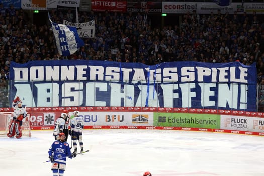 Abolishing Thursday games,is written on a banner of the Schwenninger fans,plus confetti rain on the ice brings a game interruption in the game of the DEL 24-25,10th Sptg.: Schwenninger Wild Wings vs Iserlohn Roosters