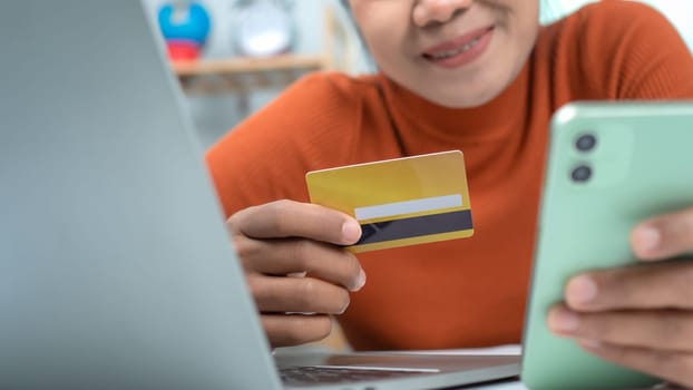 Online banking transaction concept, Woman with credit card using smart phone and shopping online, Ecommerce and secure mobile banking concept, Making online payments.