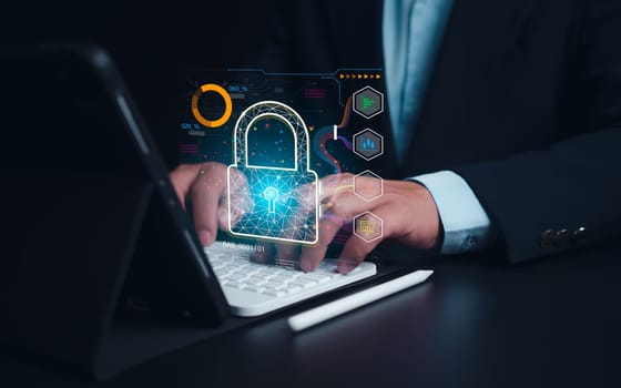 Businessman showing key and network security represents protection against cyber attacks and online hacking, Protection against external hacks, Cybersecurity and privacy concepts to protect data.