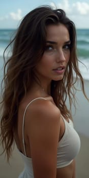 A brunette woman in a swimsuit gazes back while standing near the shoreline. Gentle sea waves lap at her feet under a clear blue sky. Long hair, beautiful young face. Travel and clothing adverts. AI.