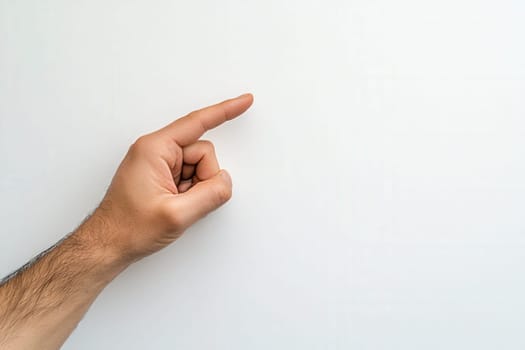 A hand gestures with fingers crossed, set against a solid white background, conveying a hopeful expression. This simple yet powerful pose often symbolizes wishing for good fortune or luck.