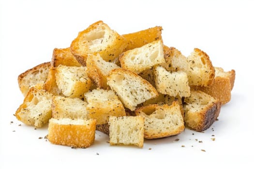 A vibrant pile of croutons, finely chopped from toasted bread and seasoned with herbs, showcases a delightful crunch. Ideal for adding texture to salads or soups, these golden morsels shine.