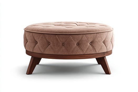 A cozy tufted ottoman with a soft texture sits prominently in the center of a modern living area, complementing the surrounding decor with its elegant design and warm colors.