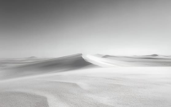 Minimalist black and white desert landscape with smooth sand dunes stretching to the horizon under a stark sky, evoking serenity and isolation.