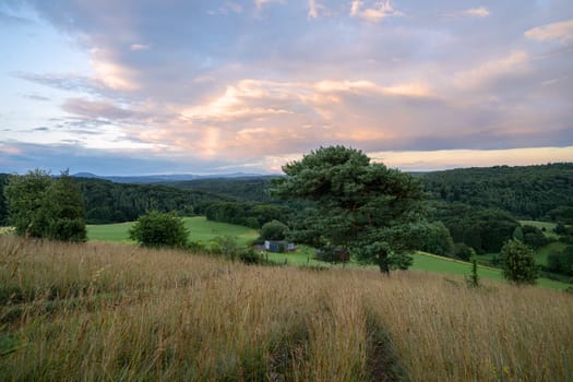 Panoramic image of summer landscape within the Eifel close to Blankenheim during sunrise, North Rhine Westphalia, Germany